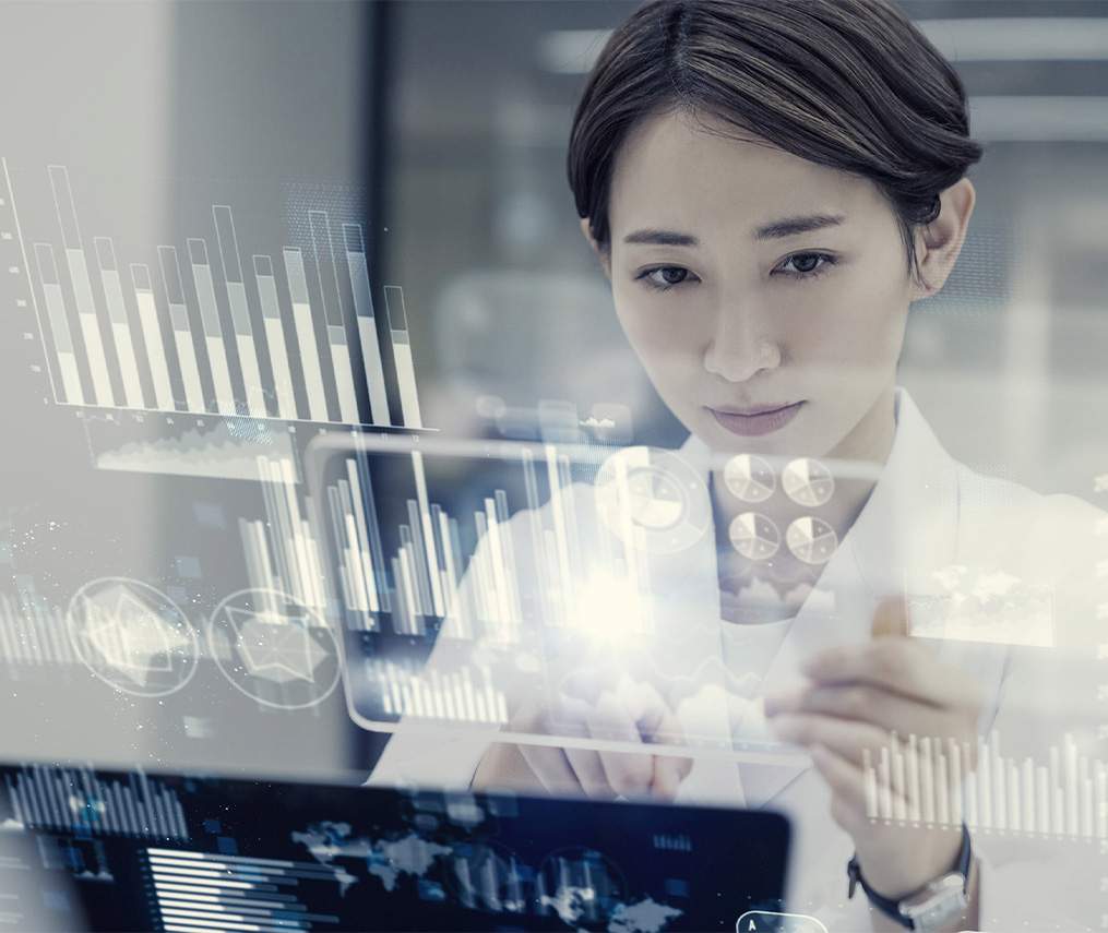 futuristic digital lab research concept with asian woman looking at a virtual display of data